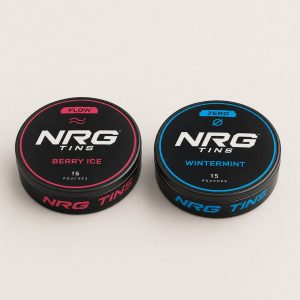NRG Tins Berry Ice + Wintermint, 2 tins on a bone studio background.