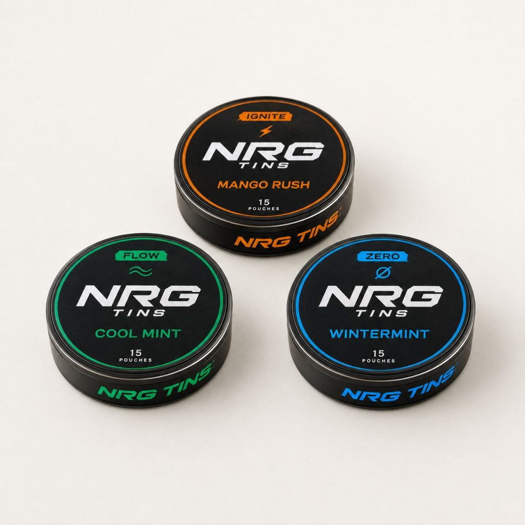 NRG Tins The Discovery Trio, 3 tins on a bone studio background.