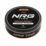 NRG Tins FLOW Peach Frost matte black tin with #F5AF83 accents, elevated three-quarter front view